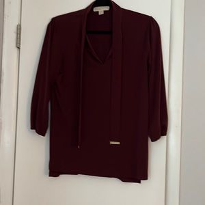 Burgundy tie-neck blouse with 3/4 sleeve and gold hardware accent EUC